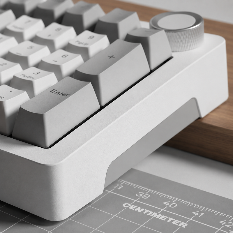 Close-up of a mechanical keyboard with a ruler in the background

